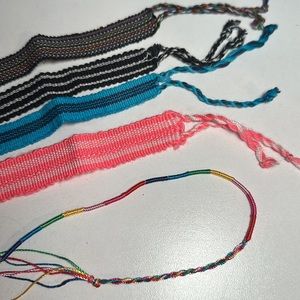 Set of four woven bracelets and one woven yarn anklet
